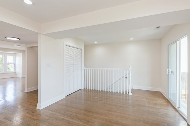 empty room with wood-type flooring