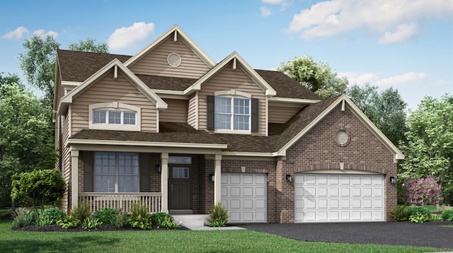 view of front facade featuring a garage and a front lawn