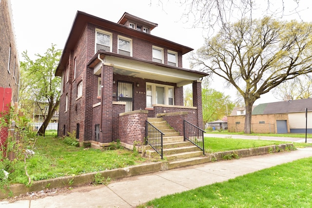 view of front of house with a front lawn and a porch