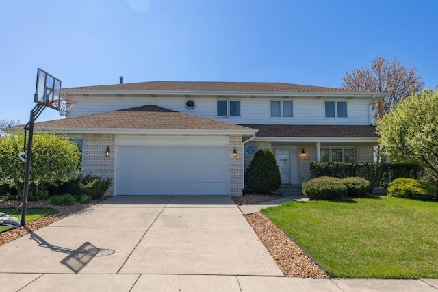 view of front property with a garage and a front yard