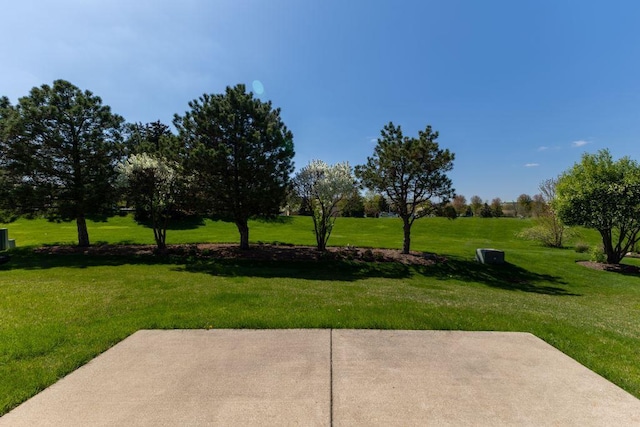 surrounding community featuring a patio and a yard