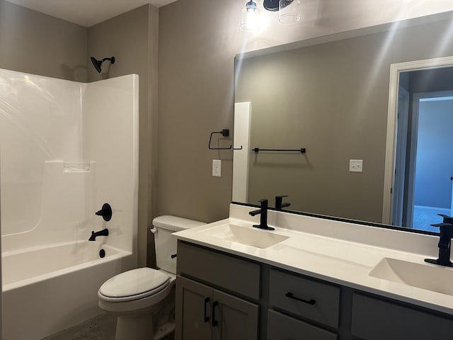 full bathroom with vanity, toilet, and shower / tub combination