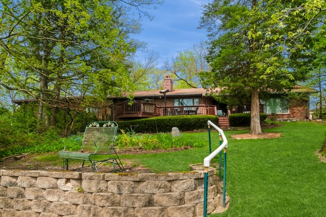 view of yard with a deck