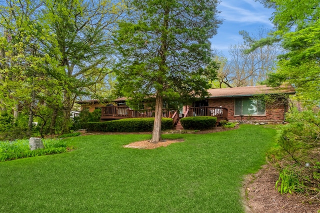 view of yard with a deck