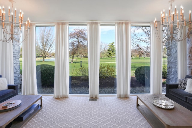 sunroom with a notable chandelier