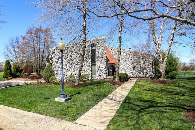 view of front of home with a front yard