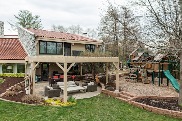 back of property with outdoor lounge area and a playground