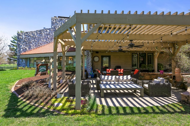 view of patio / terrace featuring ceiling fan, a pergola, and an outdoor living space