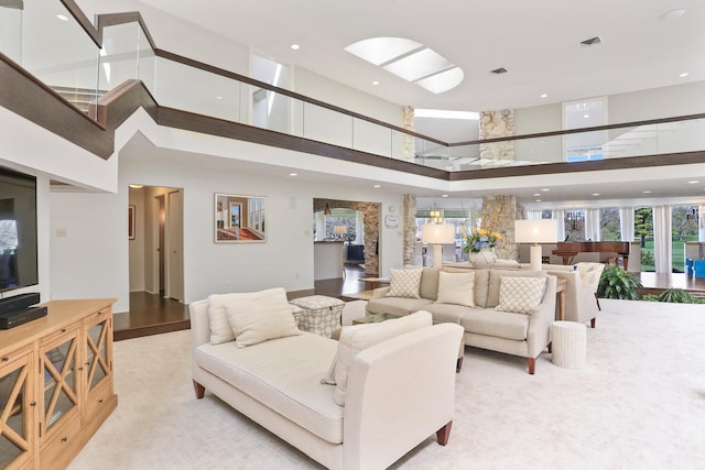 living room with a high ceiling