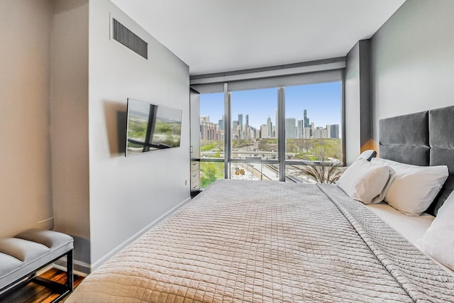 bedroom featuring hardwood / wood-style floors