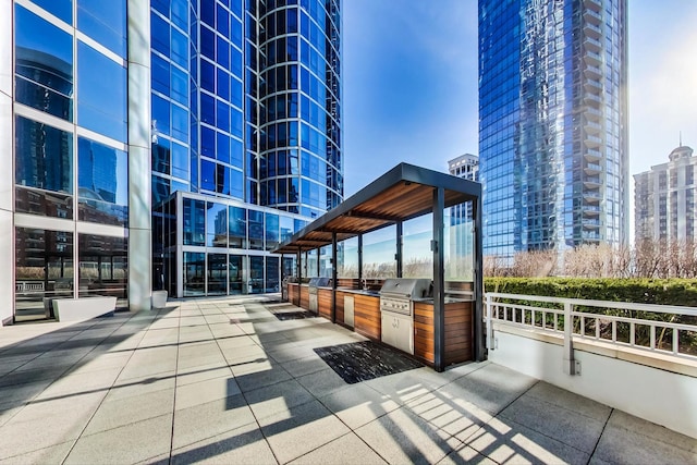 view of home's community featuring an outdoor kitchen