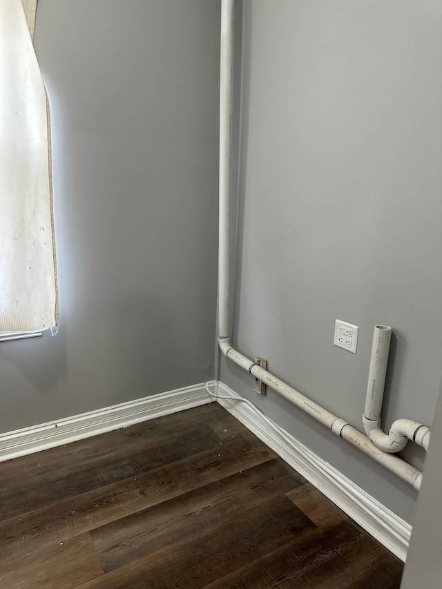 details with dark wood-type flooring