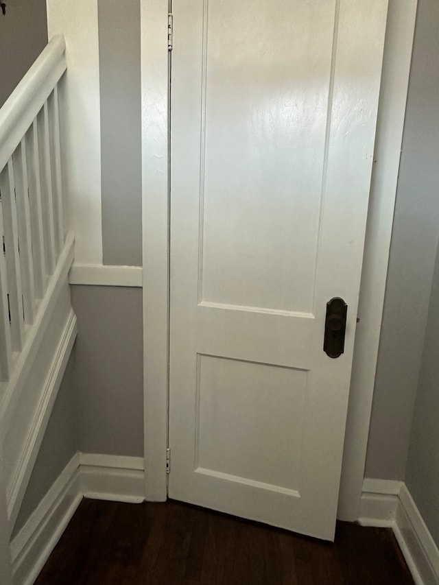 interior details with dark hardwood / wood-style flooring