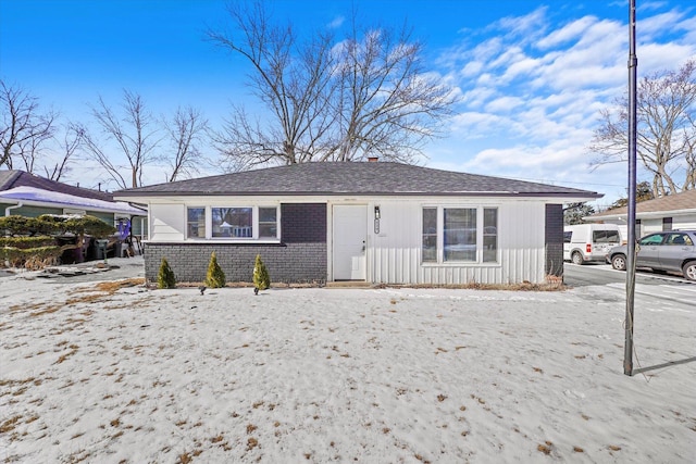 view of front of property featuring brick siding