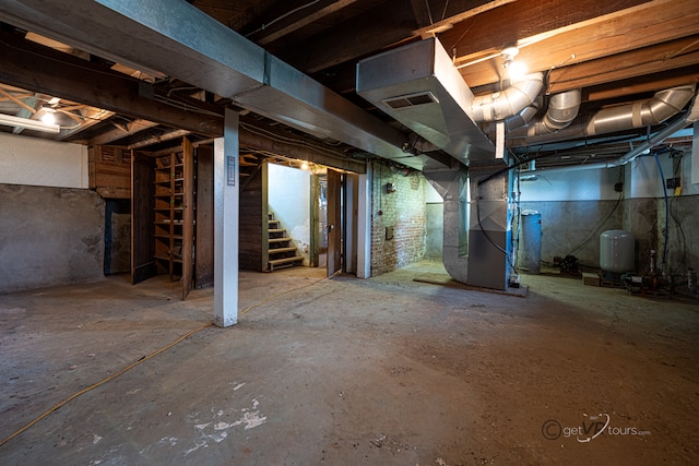 basement featuring heating utilities