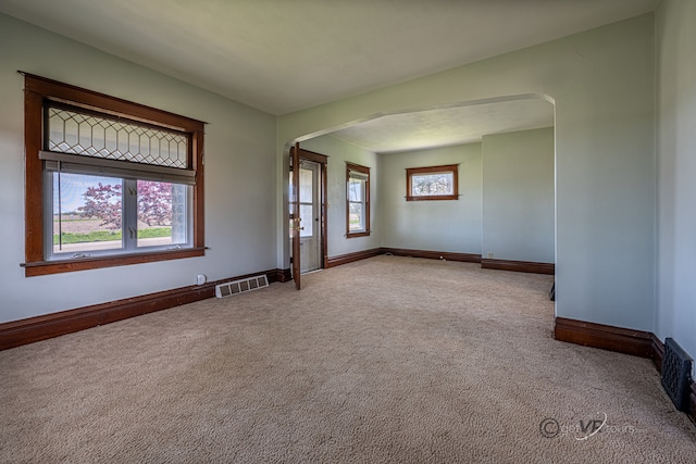 view of carpeted spare room