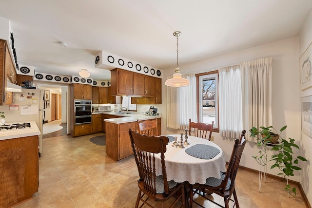 dining space with sink