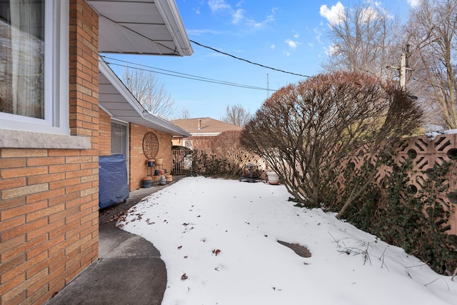 view of yard covered in snow