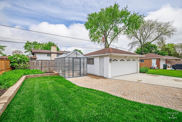 exterior space with an outdoor structure and a garage