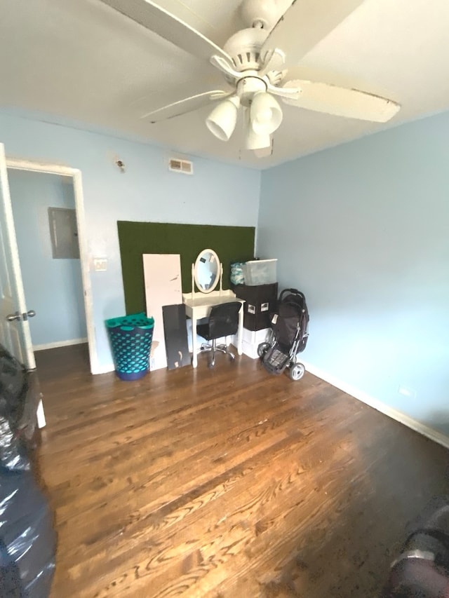 office with ceiling fan and hardwood / wood-style floors