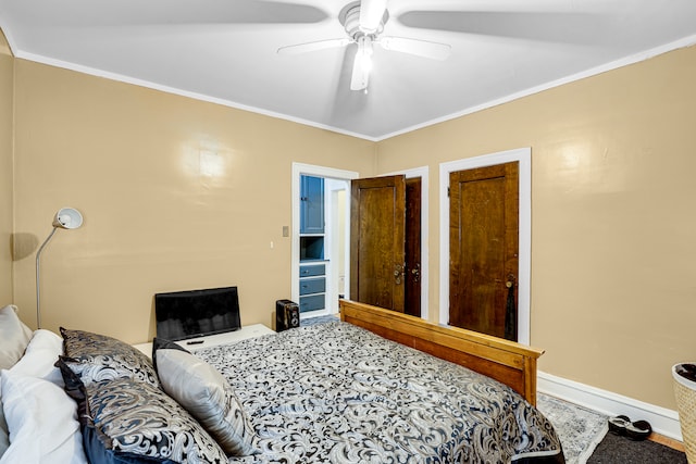 bedroom featuring ceiling fan and crown molding