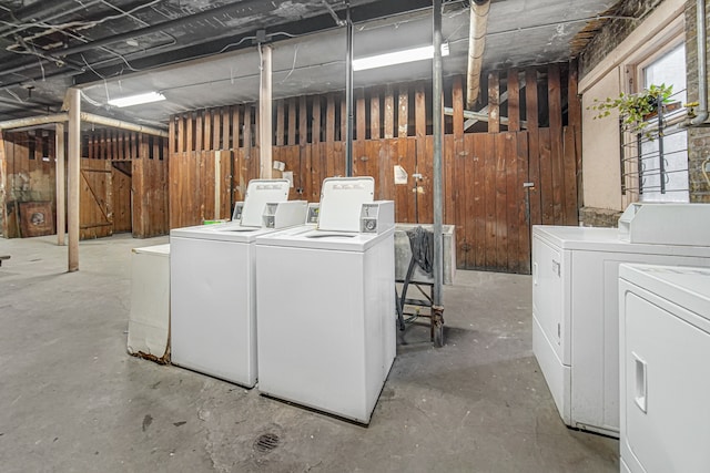 washroom with separate washer and dryer