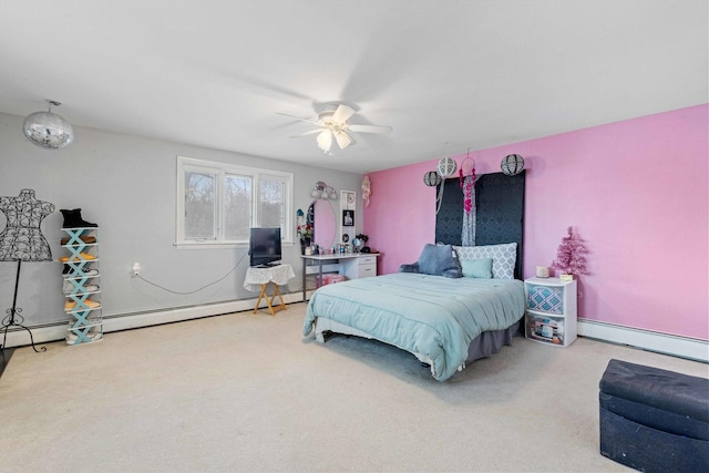 bedroom with a baseboard heating unit, carpet floors, and ceiling fan