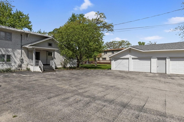 exterior space with a garage