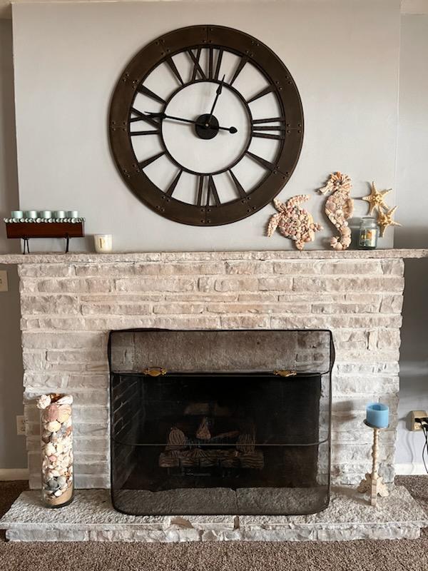 details featuring a stone fireplace