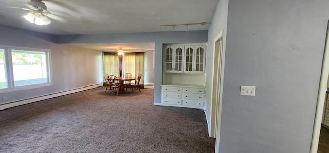 interior space featuring ceiling fan and a baseboard radiator