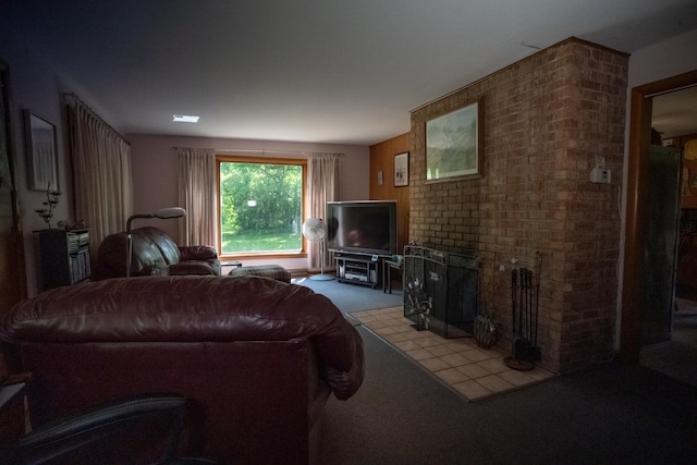 living area featuring a brick fireplace and carpet