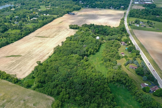 birds eye view of property featuring a rural view