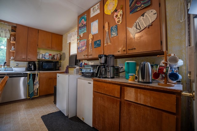 kitchen with brown cabinetry, dishwasher, light floors, black microwave, and open shelves