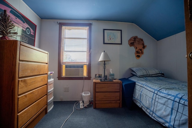 carpeted bedroom with lofted ceiling and cooling unit