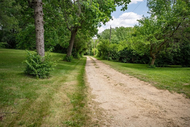 view of road featuring a view of trees