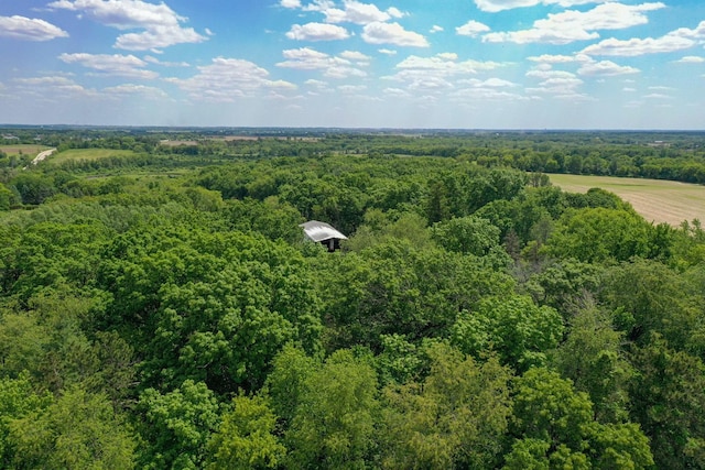 aerial view featuring a view of trees