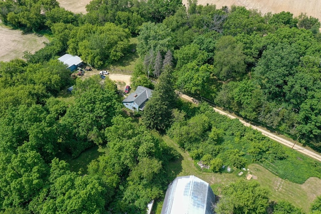 bird's eye view featuring a forest view