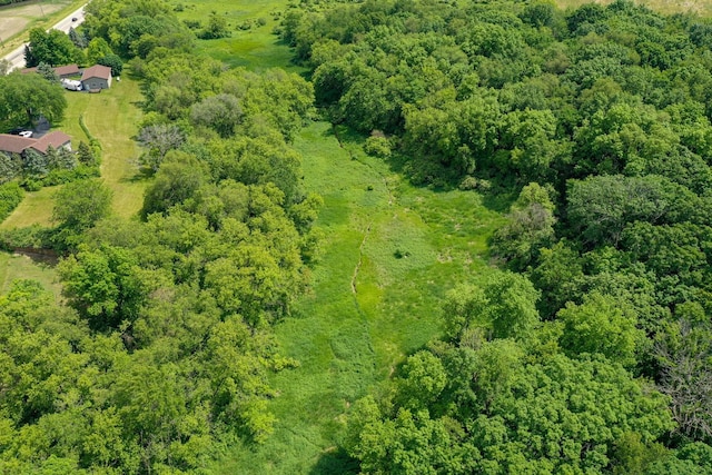 bird's eye view featuring a view of trees