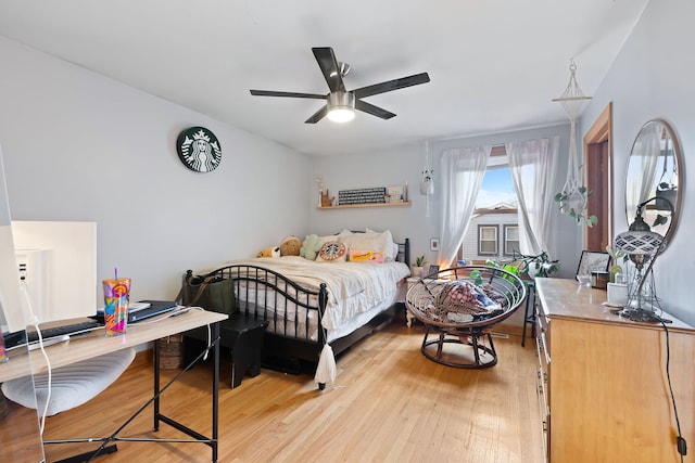 bedroom featuring light hardwood / wood-style floors and ceiling fan