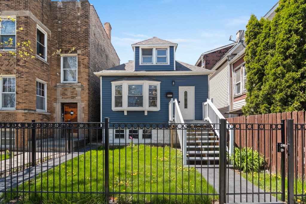 4322 N Kimball Ave, Chicago, IL 60618 - view of front of property featuring a front lawn