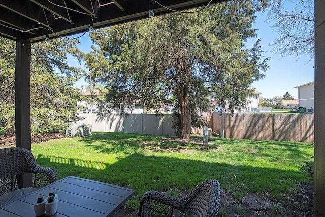 view of yard featuring fence