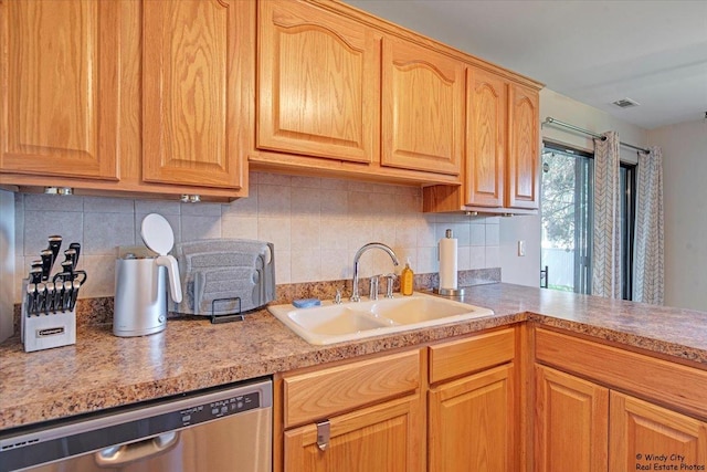 kitchen featuring a sink, light countertops, tasteful backsplash, stainless steel dishwasher, and visible vents