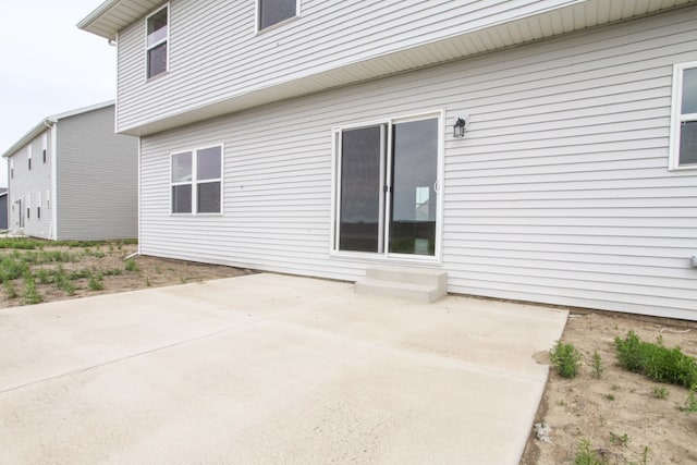 rear view of house with a patio area