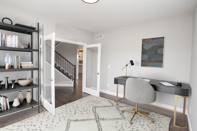 home office featuring french doors and dark wood-type flooring