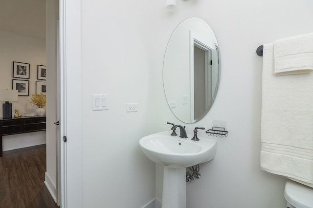 bathroom with wood finished floors