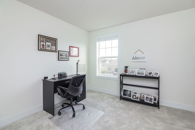 home office with carpet flooring and baseboards