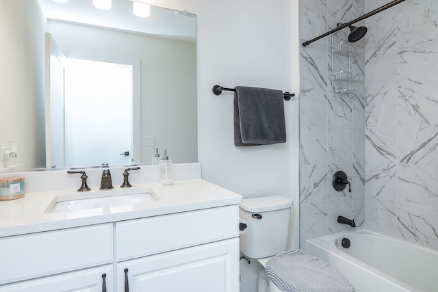 full bath featuring tub / shower combination, toilet, and vanity