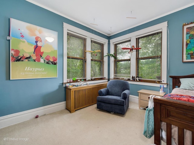 carpeted bedroom featuring baseboards