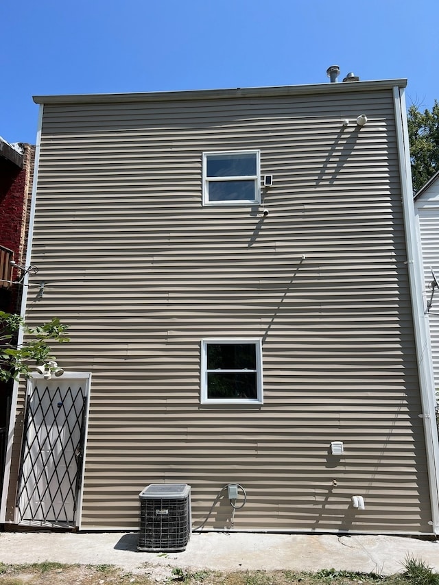 view of home's exterior featuring central AC unit