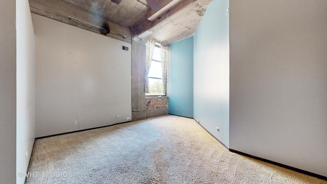 unfurnished room with light carpet and visible vents